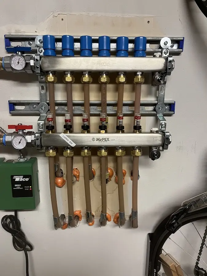 Plumber performing Water Heater Repair at a residential property in Drum Point